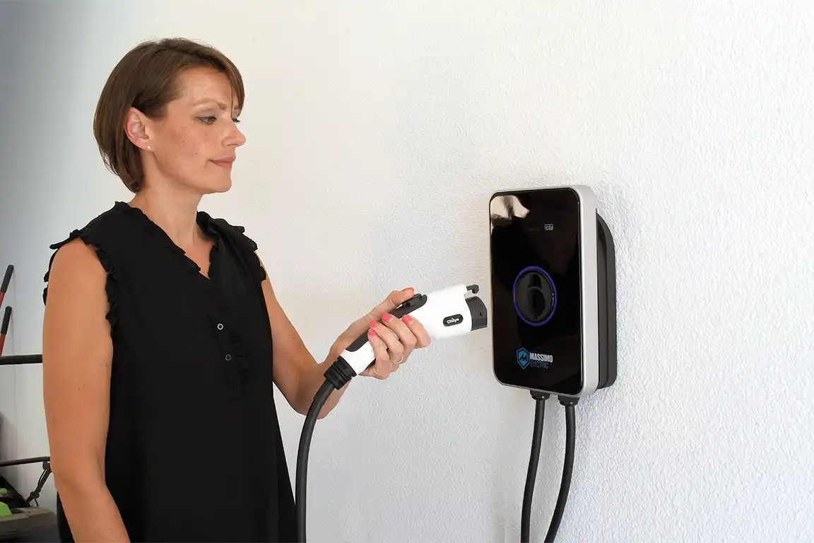 EV Charger Wall Plug in Woman